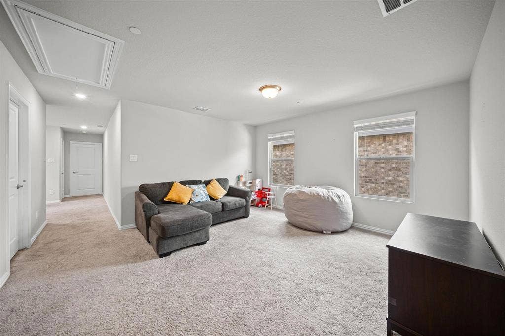 4129 Bullwhip Creek Lane, Sachse, TX 75048 Carpeted room with recessed lighting and a flush mount light fixture