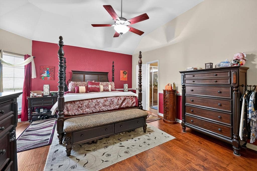 902 Nikki Drive, Cedar Hill, TX 75104 Vaulted ceiling with a ceiling fan, hardwood flooring, and a window with blinds