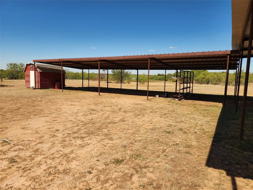 Shade structure, could be converted to animal stalls.