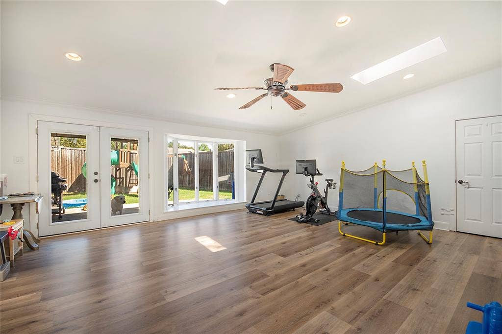 4074 Cedar Bayou Drive, Dallas, TX 75244 Spacious room featuring wood-finish flooring, recessed lighting, and a ceiling fan