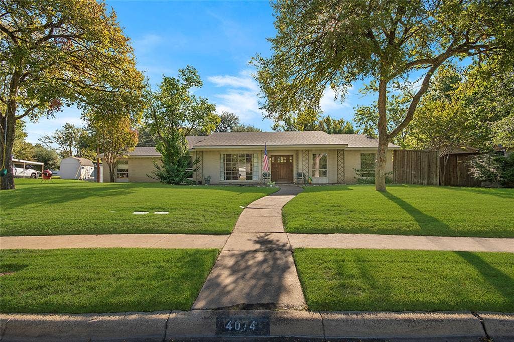 4074 Cedar Bayou Drive, Dallas, TX 75244 Single-story residence with a light-colored exterior and a gabled roof