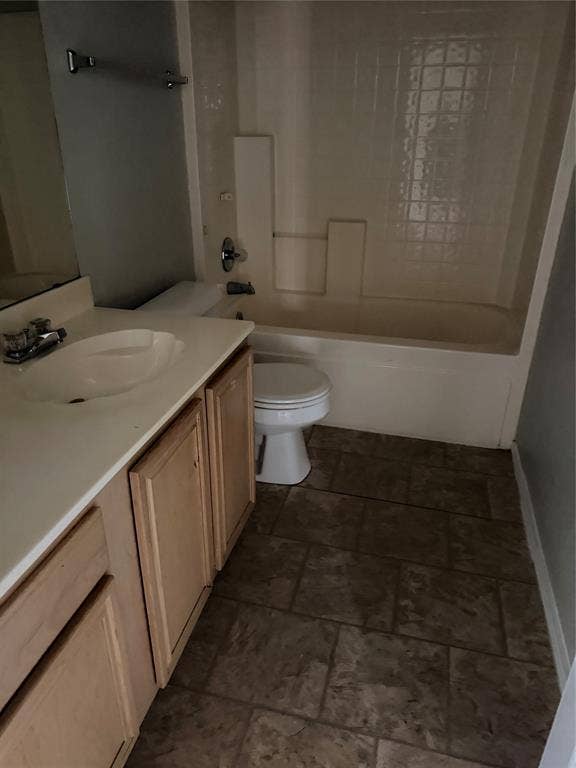 437 Kimmel Drive, Cedar Hill, TX 75104 Tile flooring, wood-finish vanity with an integrated sink, and an enclosed bathtub with tile surround
