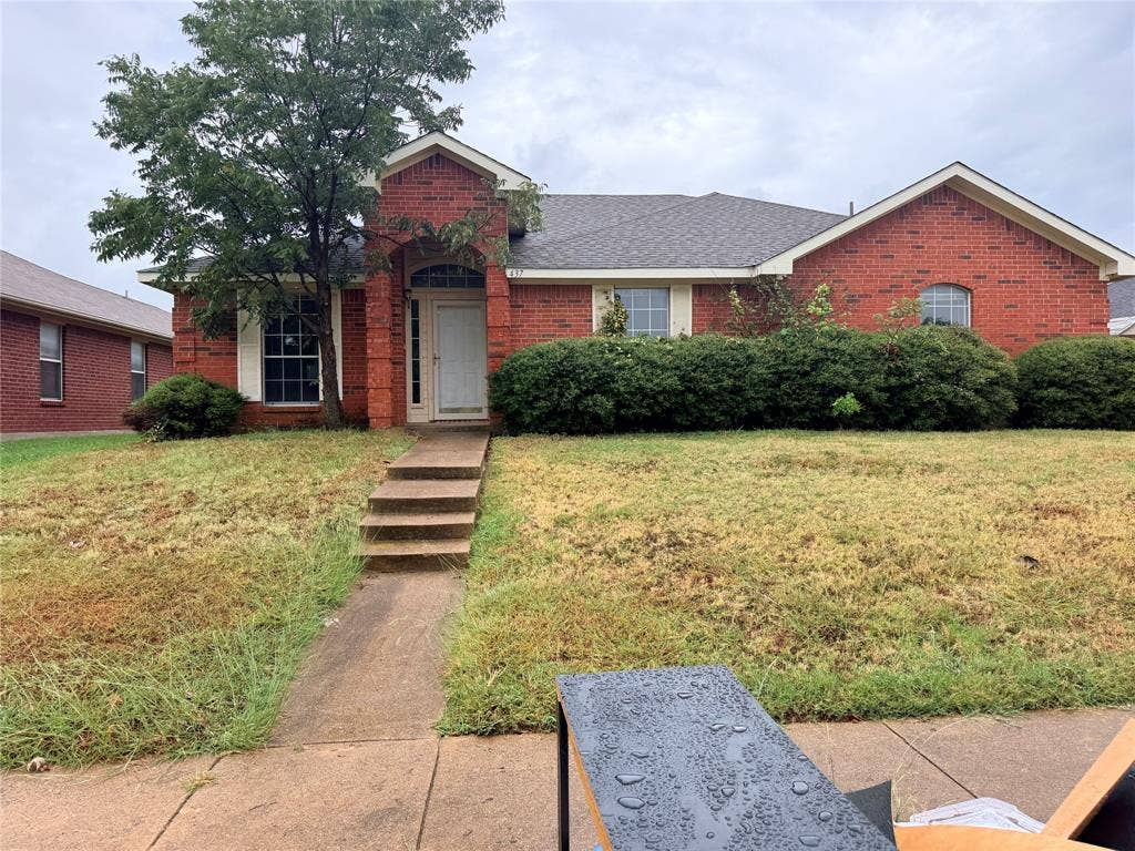 437 Kimmel Drive, Cedar Hill, TX 75104 Brick exterior with a shingle roof and arched entryway