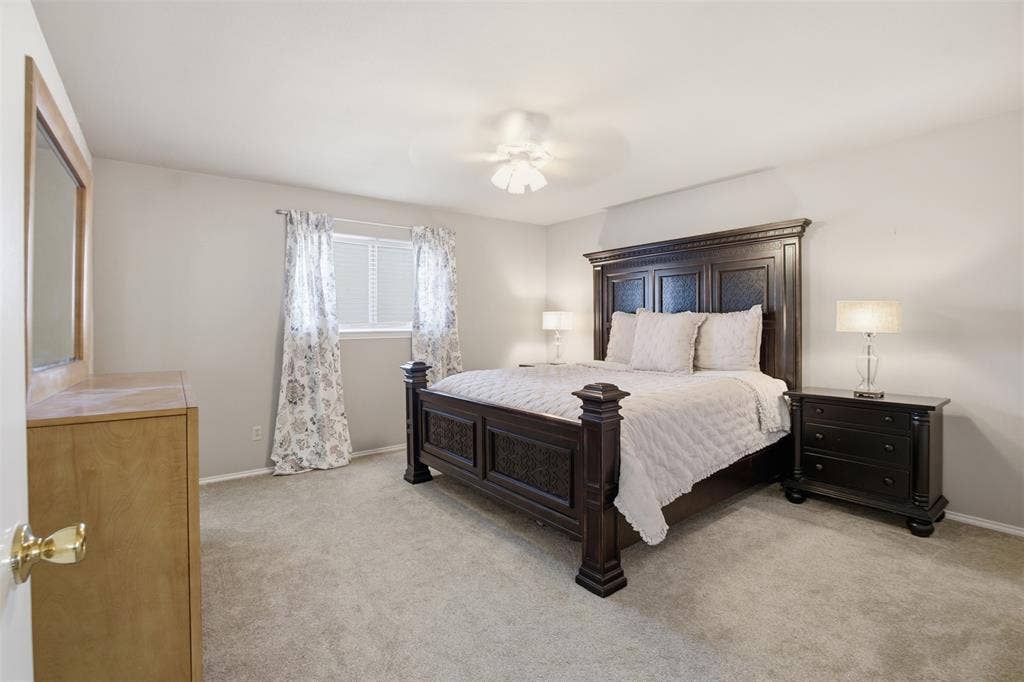 1920 Big Sky Drive, Lewisville, TX 75077 A spacious primary retreat with room to relax and recharge at the end of the day.