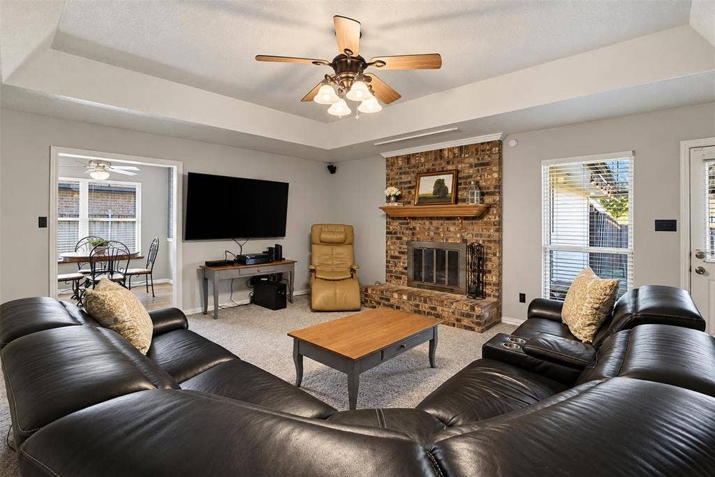 1920 Big Sky Drive, Lewisville, TX 75077 A cozy place to settle in, with a gas fireplace adding warmth and personality.