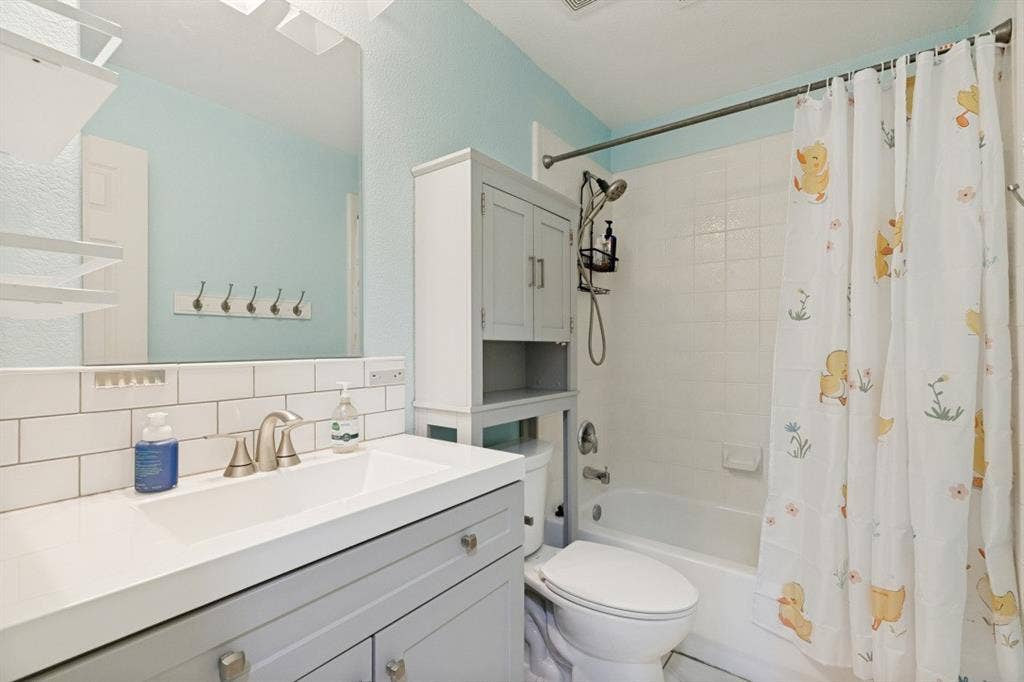 Well-appointed upstairs bathroom conveniently located near the secondary bedrooms.