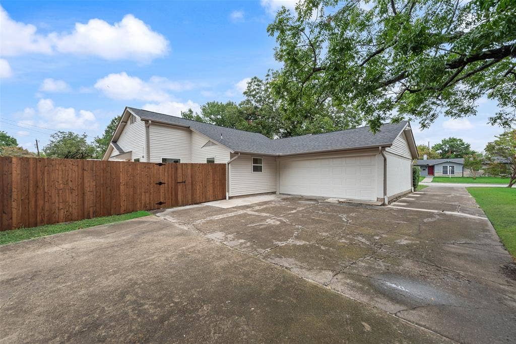 Two-car garage with convenient rear driveway access.