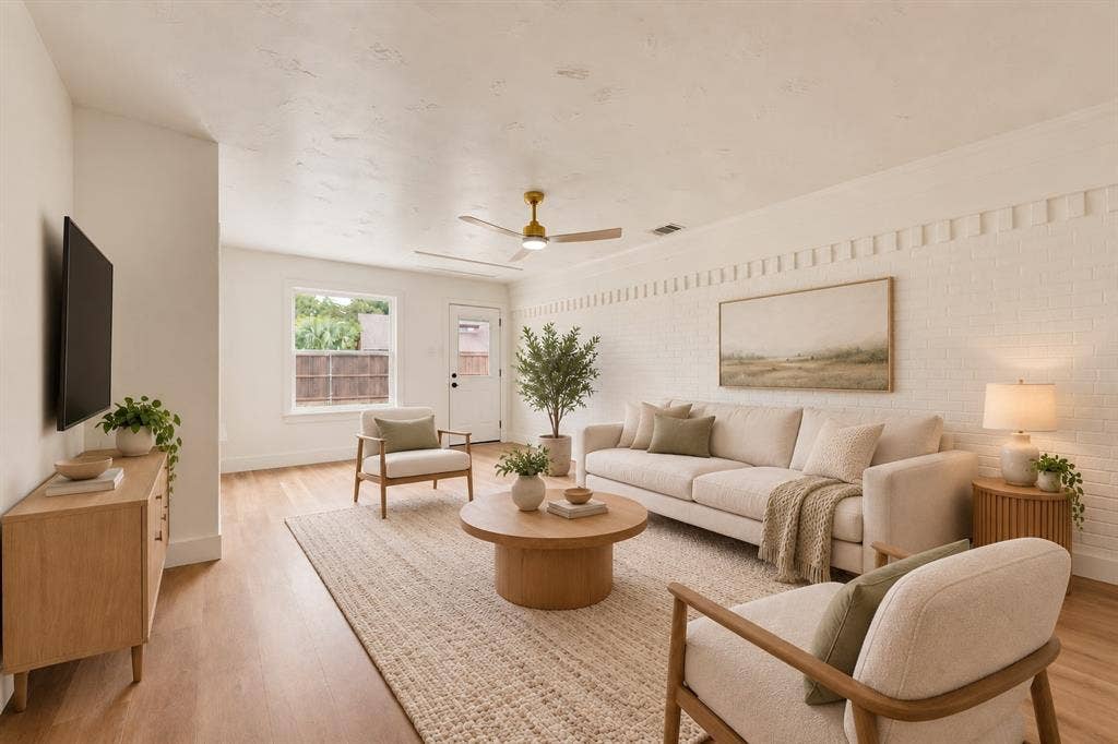 Virtually staged family room illustrates a warm and inviting layout.