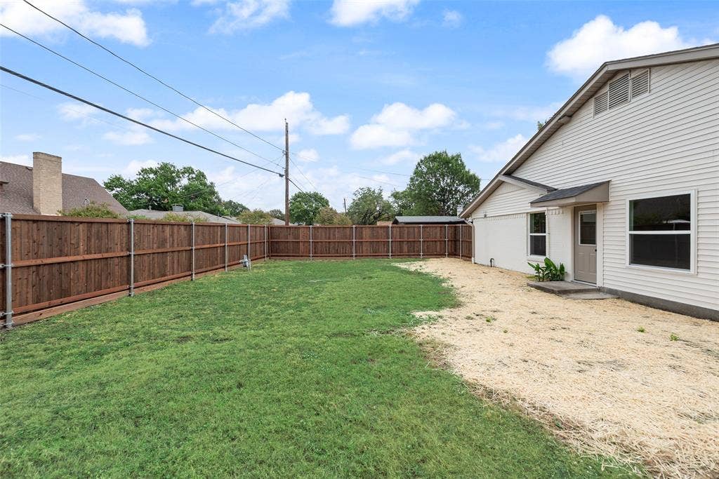 Second backyard view highlights the generous outdoor space.