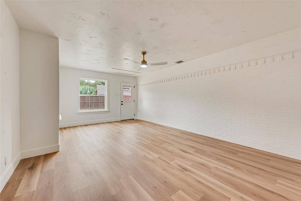 Spacious family room with plenty of room to relax or entertain.