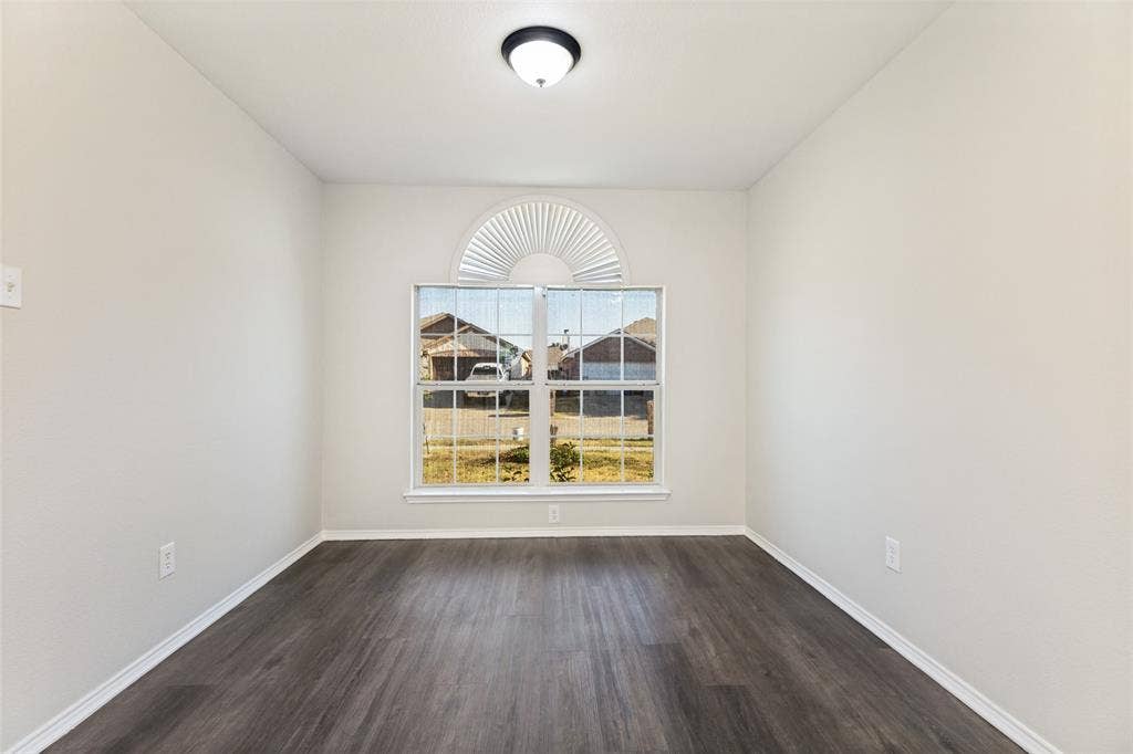 4545 Grainland Court, Fort Worth, TX 76179 Wood-finish flooring with white trim