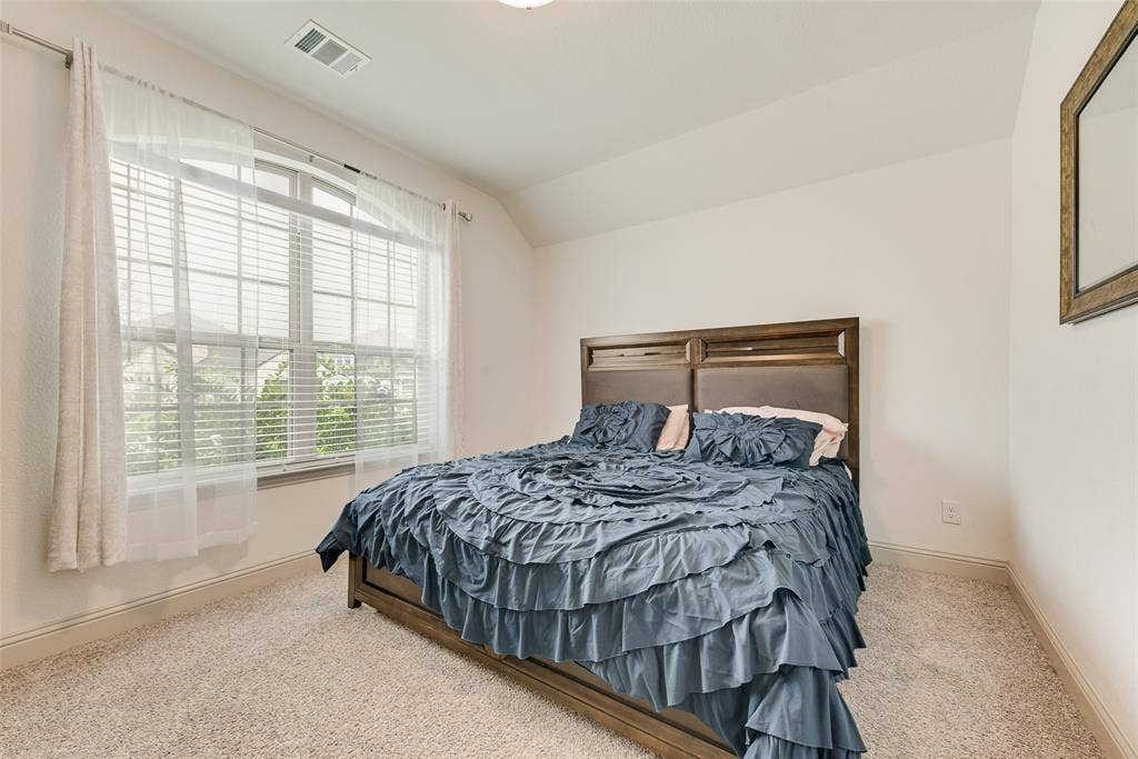 107 White Sands Lane, Forney, TX 75126 Large window with horizontal blinds, light-toned walls, and carpeted flooring