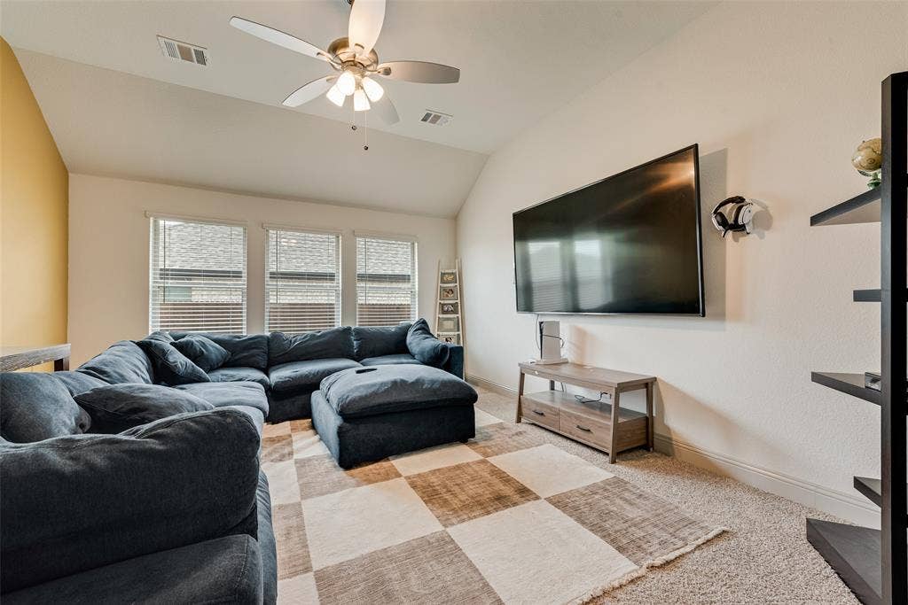 107 White Sands Lane, Forney, TX 75126 Separate game room with a ceiling fan, three windows with blinds, and carpeted flooring