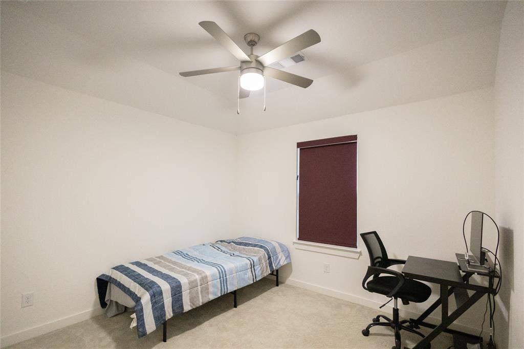 3017 Andorra Road, McKinney, TX 75071 Neutral-toned carpeting paired with light walls