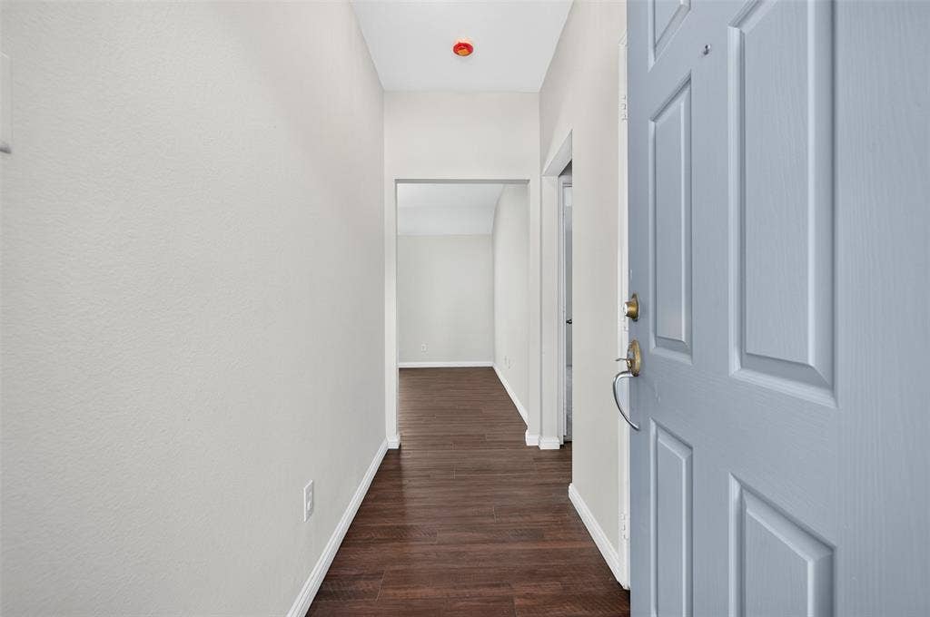 2724 Douglas Drive, McKinney, TX 75071 Entry featuring LVP flooring and light-toned walls