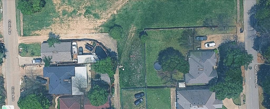 Aerial Survey. Presenting an overhead perspective of the property and its immediate surroundings