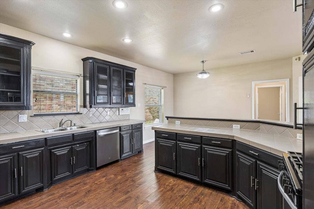 2047 Chevella Drive, Dallas, TX 75232 Kitchen with lots of counter and storage space. Easy access to the breakfast room