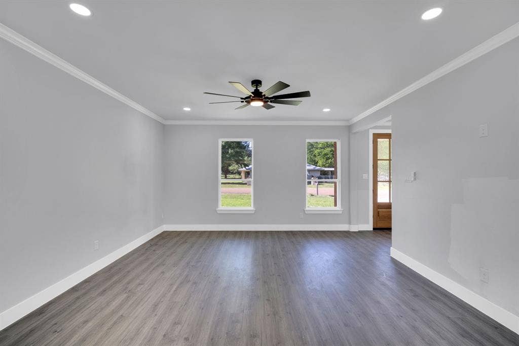 1995 Lakeview Drive, Kemp, TX 75143 Recessed ceiling lighting, wood-finish flooring, two windows, ceiling fan with integrated lighting, and a wood entry door with frosted glass panels