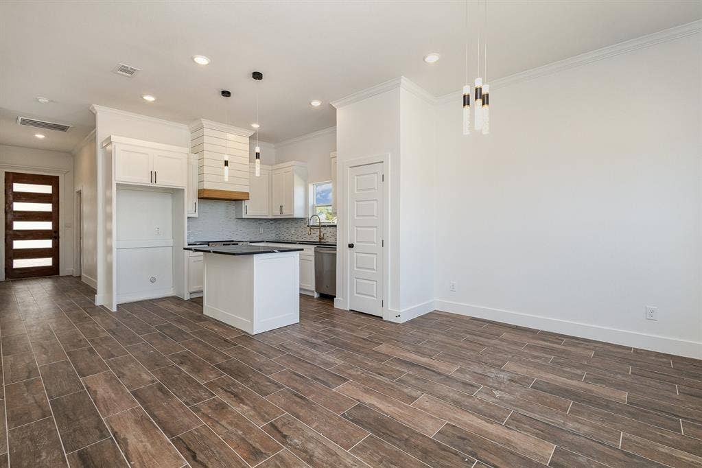 230 Flying Bridge Drive, Gun Barrel City, TX 75156 Looking towards kitchen & entry from dining room.