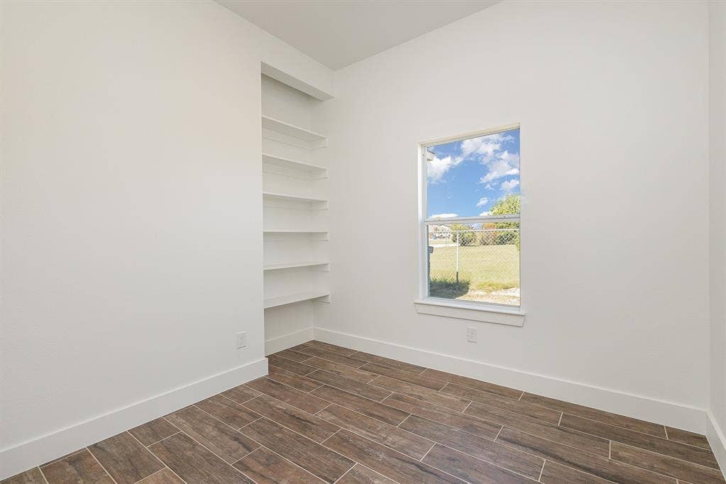 230 Flying Bridge Drive, Gun Barrel City, TX 75156 or flex room with built-in shelving