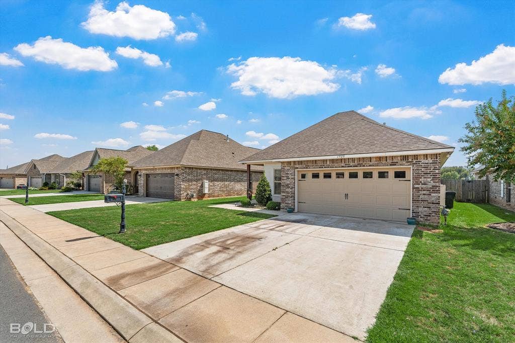 Brick and stone veneer exterior with a gabled roof
