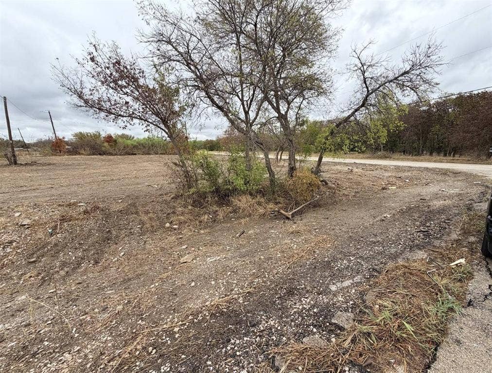 5374 Pixie Lane, Dallas, TX 75236 Corner lot at 5374 Pixie Ln featuring open commercial frontage. Zoned PD 101 with dual street access and city utilities available at the street.