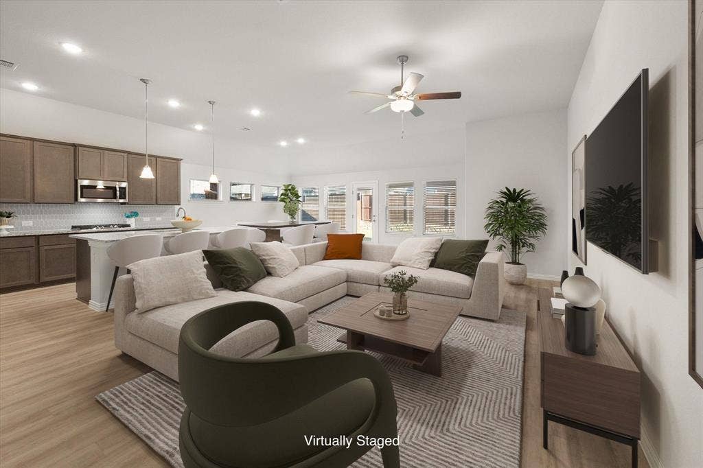 Open concept living, dining, kitchen offers much flexibility in how you use the space