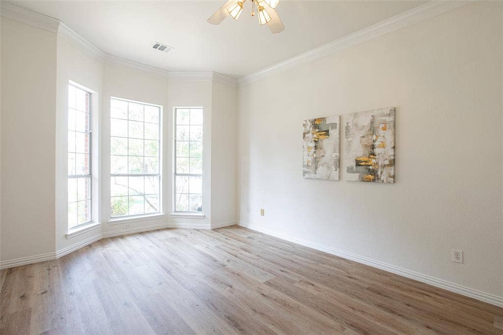 Enjoy the huge primary bedroom with bay windows and ensuite bathroom.