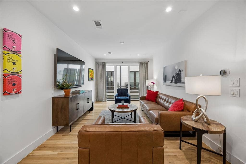 7207 Gaston Avenue, #903, Dallas, TX 75214 Bright and inviting living area with views to outside green space and a personal balcony.