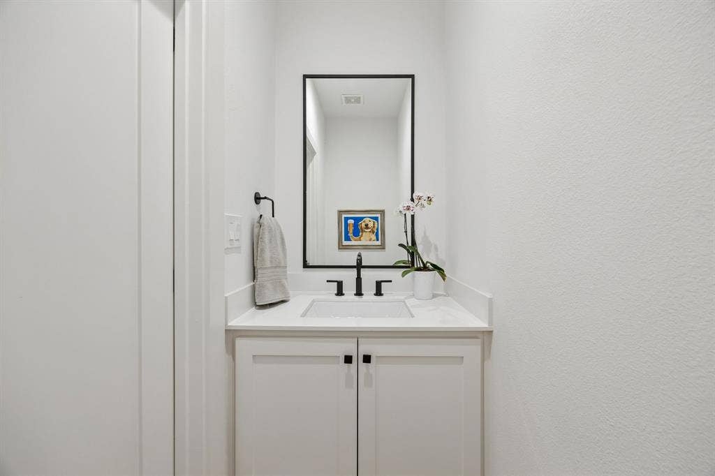 7207 Gaston Avenue, #903, Dallas, TX 75214 Half bath of living and kitchen area makes perfect for guest while visiting or entertaining