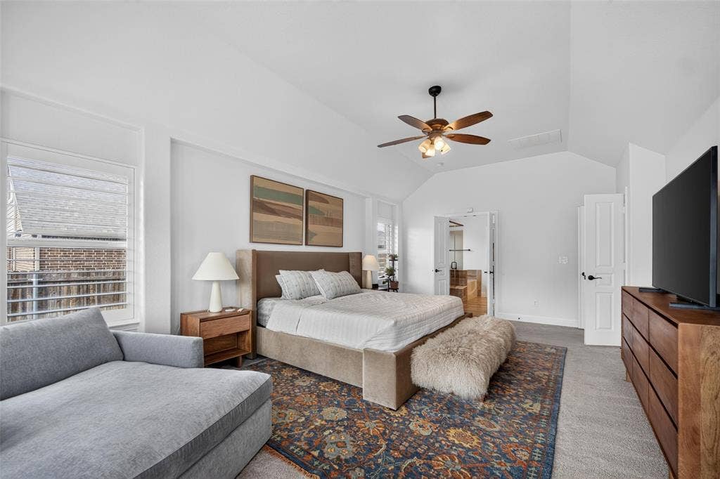 3210 Creekhaven Drive, Melissa, TX 75454 Vaulted ceilings, neutral carpeting, window shutters, and a ceiling fan with integrated lighting