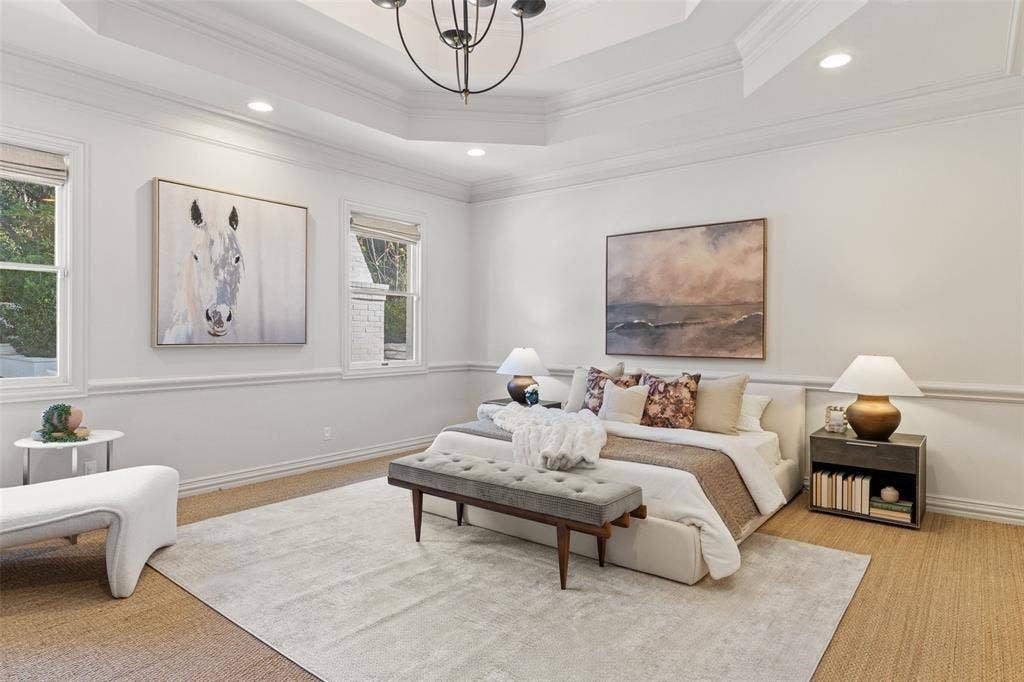 4201 Green Cliffs Road, Austin, TX 78746 Recessed lighting illuminates a coffered ceiling, complemented by a central chandelier