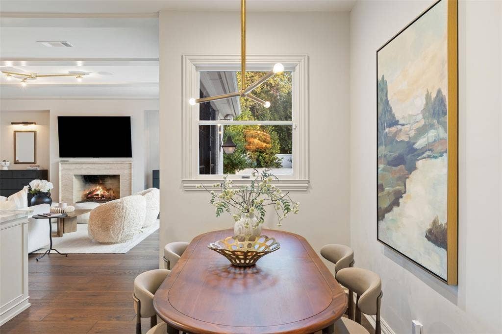 4201 Green Cliffs Road, Austin, TX 78746 Hardwood flooring, a natural light window, and a built-in fireplace