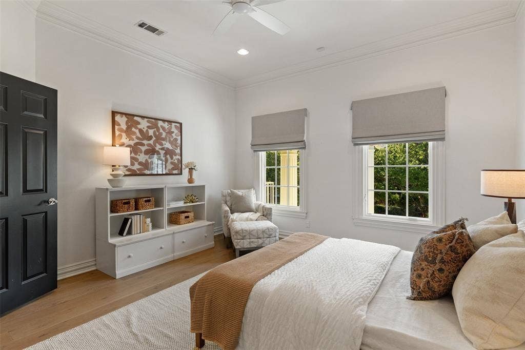 4201 Green Cliffs Road, Austin, TX 78746 Hardwood-style flooring throughout, crown molding, and recessed lighting