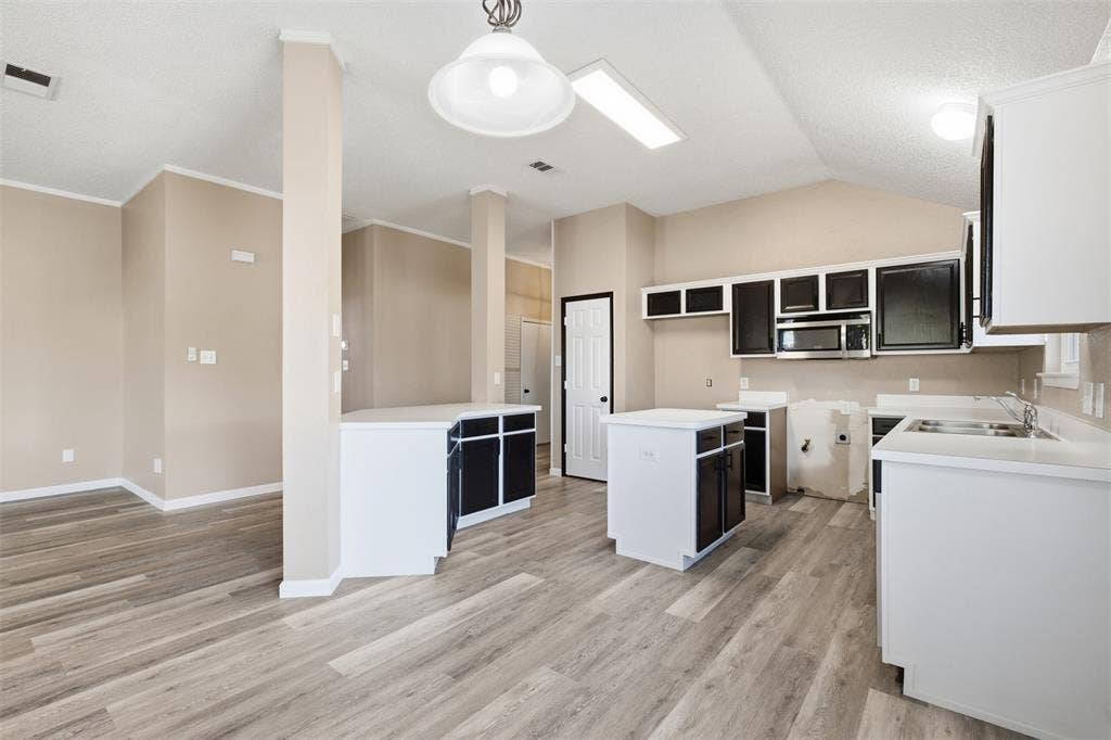1301 Mill Wood Lane, Garland, TX 75040 OPEN KITCHEN WITH BUILTIN MICROWAVE