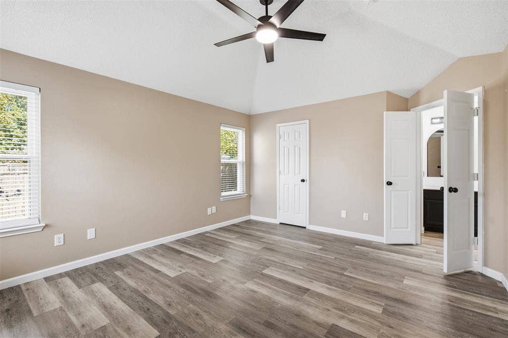 1301 Mill Wood Lane, Garland, TX 75040 DOUBLE DOORS LEAD TO PRIMARY BATH