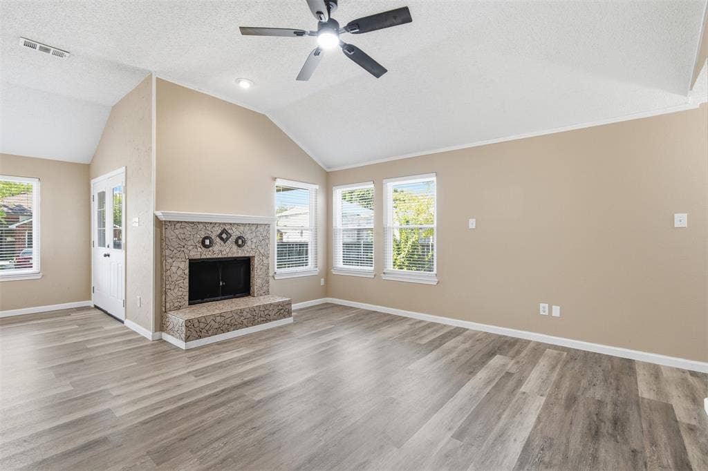 1301 Mill Wood Lane, Garland, TX 75040 FAMILY ROOM HAS FIREPLACE WITH GAS STARTER