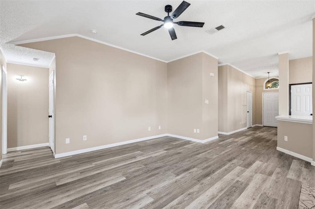 1301 Mill Wood Lane, Garland, TX 75040 ENTRY LEADS TO OPEN FLOOR PLAN
