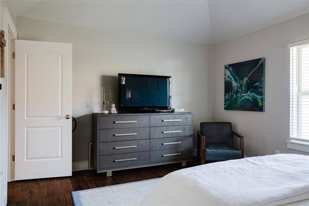 Hand-scraped wood flooring with light-toned walls
