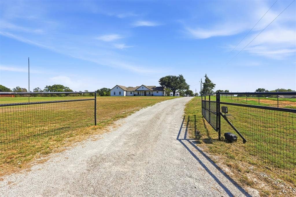 Entrance gate to this beautiful 5 acre property.