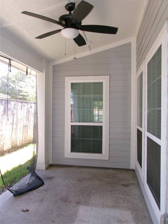 665 Stonewall Drive, Grand Prairie, TX 75052 Covered patio featuring a ceiling fan, concrete flooring, and horizontal siding
