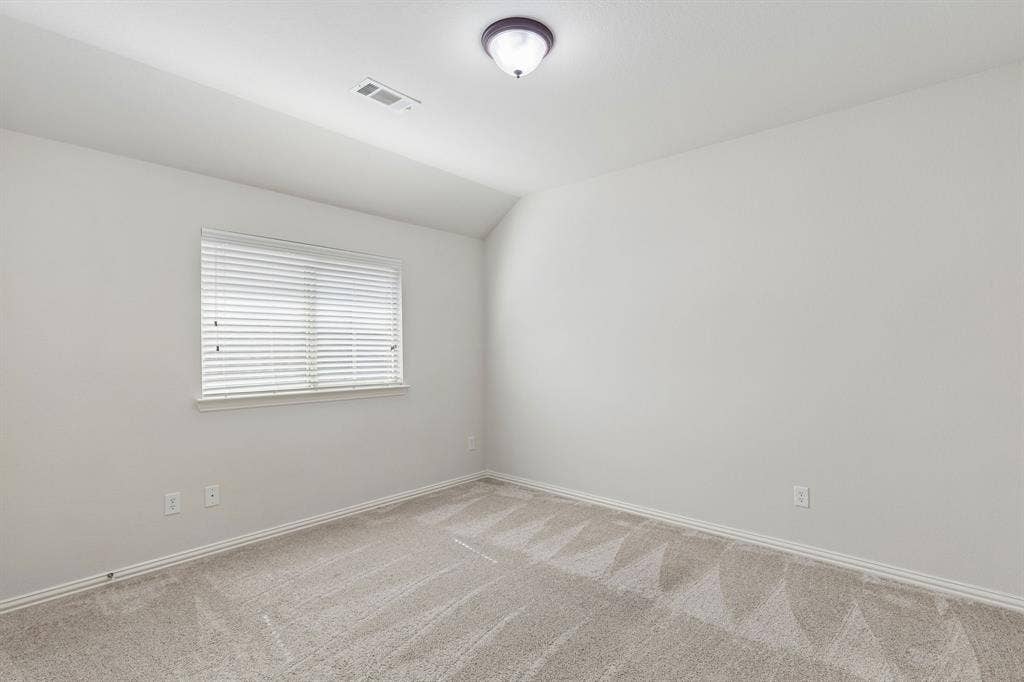 1906 Faircrest Lane, Wylie, TX 75098 Split secondary bedroom with carpet.