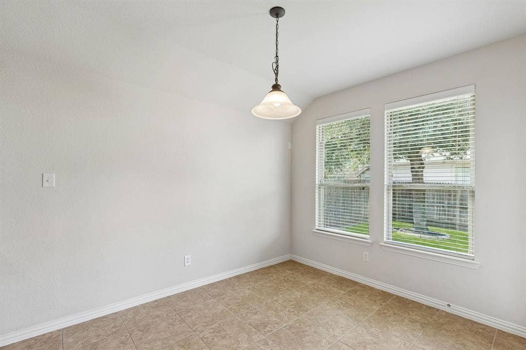1906 Faircrest Lane, Wylie, TX 75098 The casual dining space offers tile flooring, views of the back yard and great natural light.