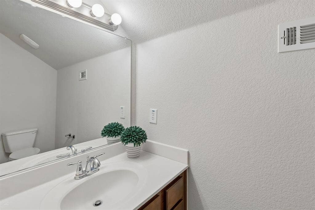 1906 Faircrest Lane, Wylie, TX 75098 Half bath on the second floor.