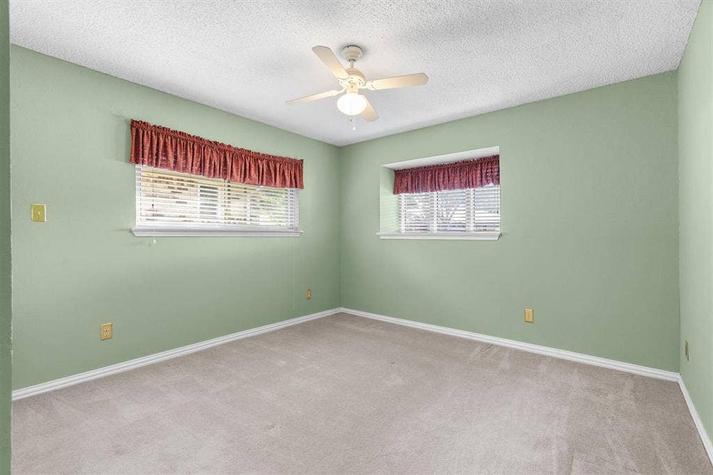 1305 Stonewood Drive, Carrollton, TX 75006 Sun-filled bedroom with abundant natural light
