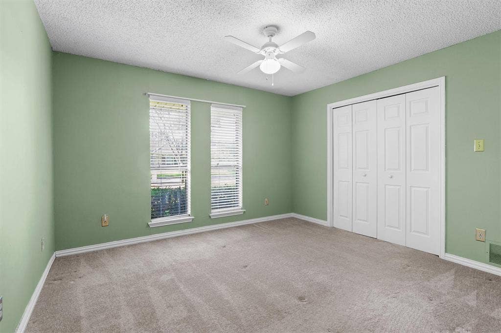 1305 Stonewood Drive, Carrollton, TX 75006 Bright and airy bedroom with natural lighting