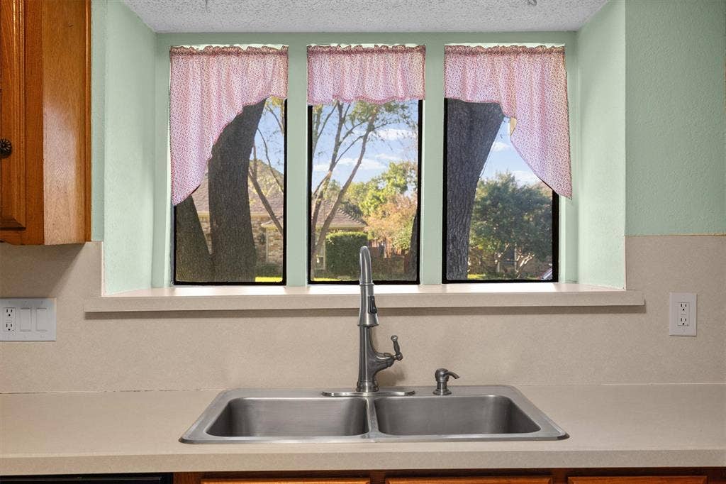 1305 Stonewood Drive, Carrollton, TX 75006 Bay window above the sink—perfect for indoor plants or herbs