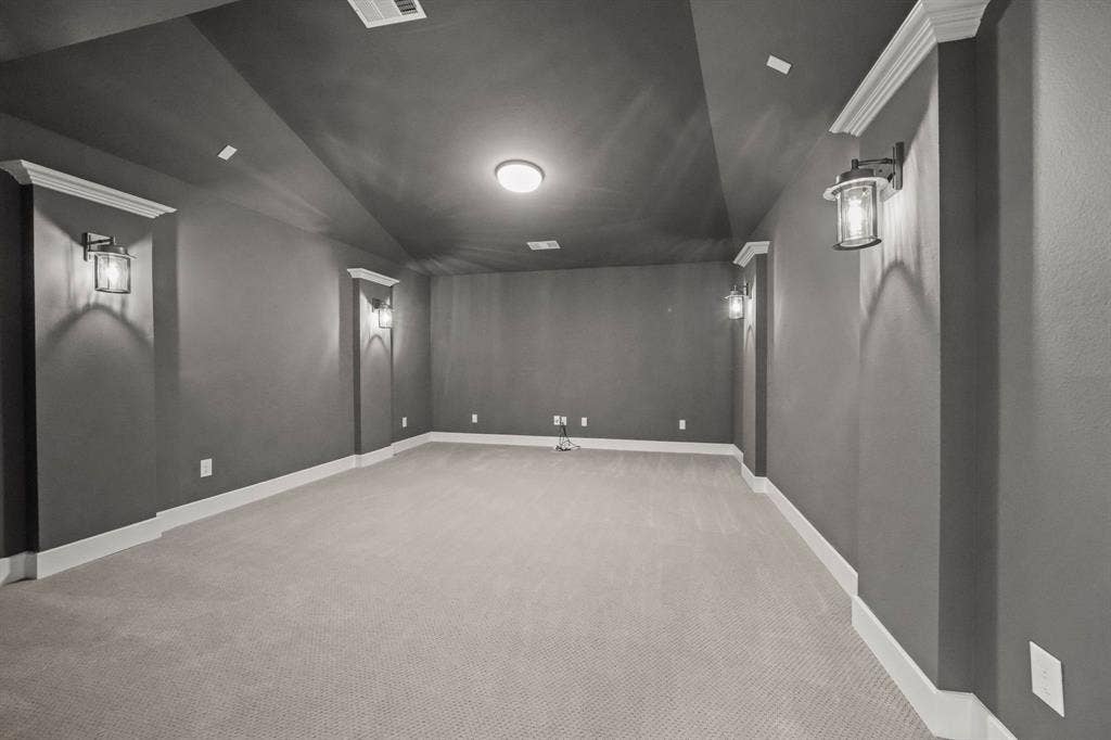 2628 Camden Court, Celina, TX 75009 Vaulted ceilings featuring recessed lighting, wall-mounted lantern-style sconces, and crown molding