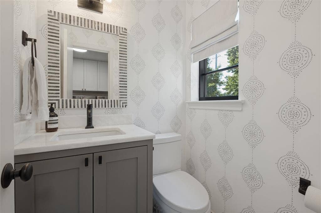 5222 Meadow Crest Drive, Dallas, TX 75229 Separate stylish powder bath off utility room.