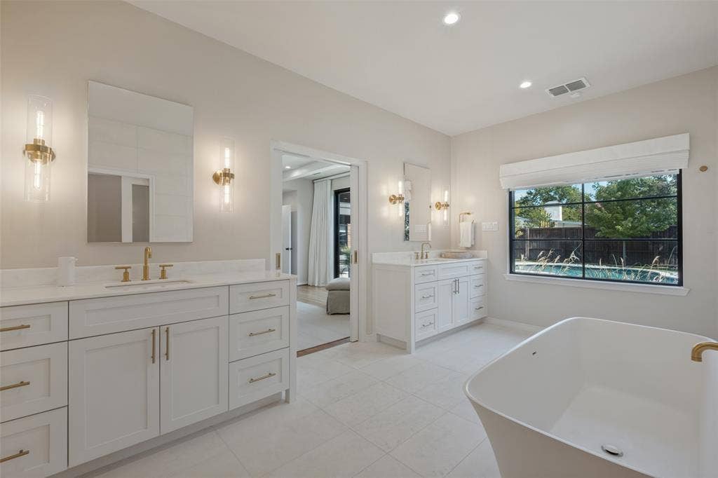 5222 Meadow Crest Drive, Dallas, TX 75229 Spa like primary bathroom with separate vanities.